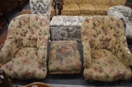 A pair of Victorian style button upholstered armchairs with matching footstool.