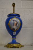 A decorative French porcelain and ormolu lamp base.