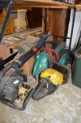 A petrol hedge cutter and leaf blower together with an electric hedge cutter and leaf blower.