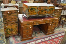 An unusual Chinese decoratively painted double sided coffee table / storage unit, complete with a