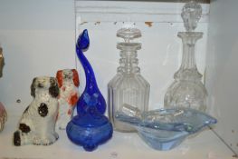 Two Staffordshire dogs and various glassware.