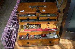 An M & W tool cabinet containing numerous tools, micrometers etc.