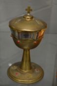 A continental silver and gilt decorated chalice and cover.