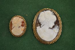 Two 9ct gold hallmarked mounted cameo brooches.