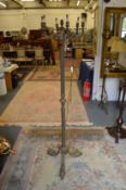 An ornate floor standing lamp.
