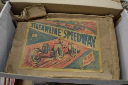 A Louis Marx tin-plate Streamline Speedway toy, complete with remnants of original box.
