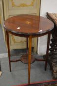 An inlaid mahogany circular occasional table.