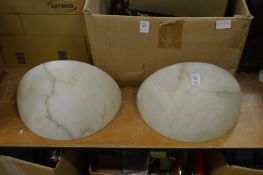 A pair of alabaster wall shades.