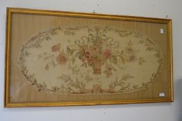An Aubusson style tapestry picture of a basket of flowers, decoratively gilt framed and glazed.