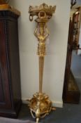 A highly ornate ormolu floor standing stand, the column modelled as a female caryatid figure.
