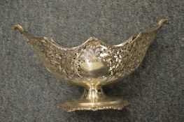 A pierced silver boat shaped pedestal sugar bowl (lacking liner).