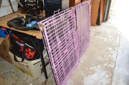 Two folding dog cages.