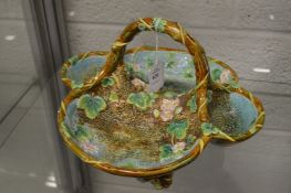 A Majolica strawberry dish.