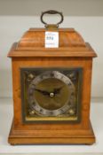 A small walnut cased bracket clock by Mappin & Webb.