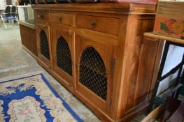 A continental style hardwood sideboard.