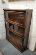 An oak three section bookcase, probably Globe Wernicke.