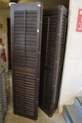 A pair of bi-fold louvre screens.