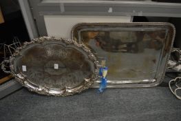 Two silver plated twin handled trays.