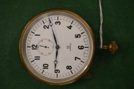 An Omega watch, possibly from an early car or aeroplane (hairline cracks to the dial).