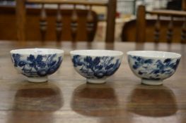 Three Chinese blue and white decorated tea bowls.
