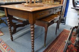 A modern oak two drawer writing table / desk.