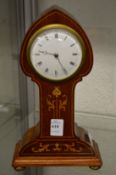 A good Art Nouveau inlaid mahogany mantle clock.