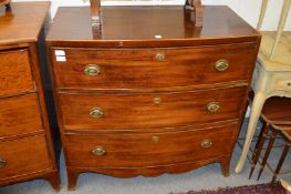 A mahogany bow front three drawer chest.