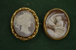 Two cameo brooches.