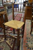 A set of six 19th century rush seated spindle back dining chairs (one AF).