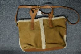 An Ugg handbag.
