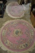 Two Chinese pink ground rugs.
