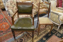 An oak desk chair and an occasional chair.