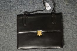 A black leather handbag.