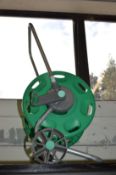 A garden hose holder.