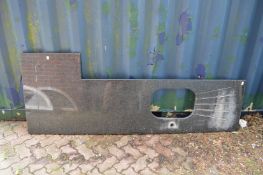 A large granite kitchen work top with cut-out for basin.