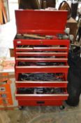 A workshop tool chest / trolley containing numerous tools.