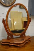 A Victorian walnut dressing table mirror.