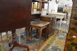 A small mahogany chest, a nest of tables and tilt top table.