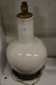A Chinese crackle glaze bottle vase converted to a lamp.