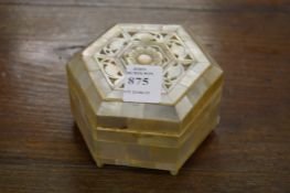 A mother-of-pearl box.