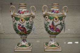 A pair of Samson of Paris porcelain twin handled pedestal vases.