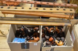 A good collection of tobacco pipes and other items.
