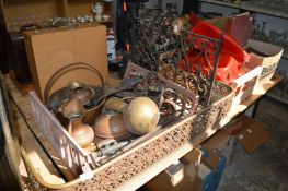 A wrought iron fireguard, brass fender and other metalware.