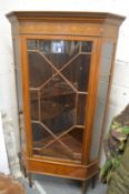 A good inlaid mahogany corner cabinet on stand.