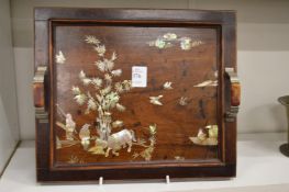 A Chinese mother-of-pearl inlaid rosewood panel or tray.