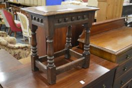 An oak joint stool.