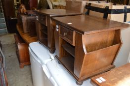 A pair of lamp / magazine tables.