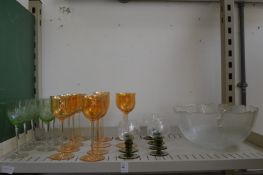 A shelf of glassware.