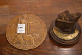 WWI death plaque for Joseph Martin Tibbles together with a mounted piece of HMS Invincible.