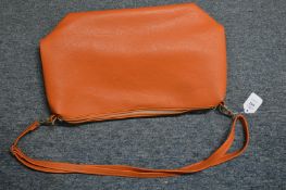 An orange handbag.